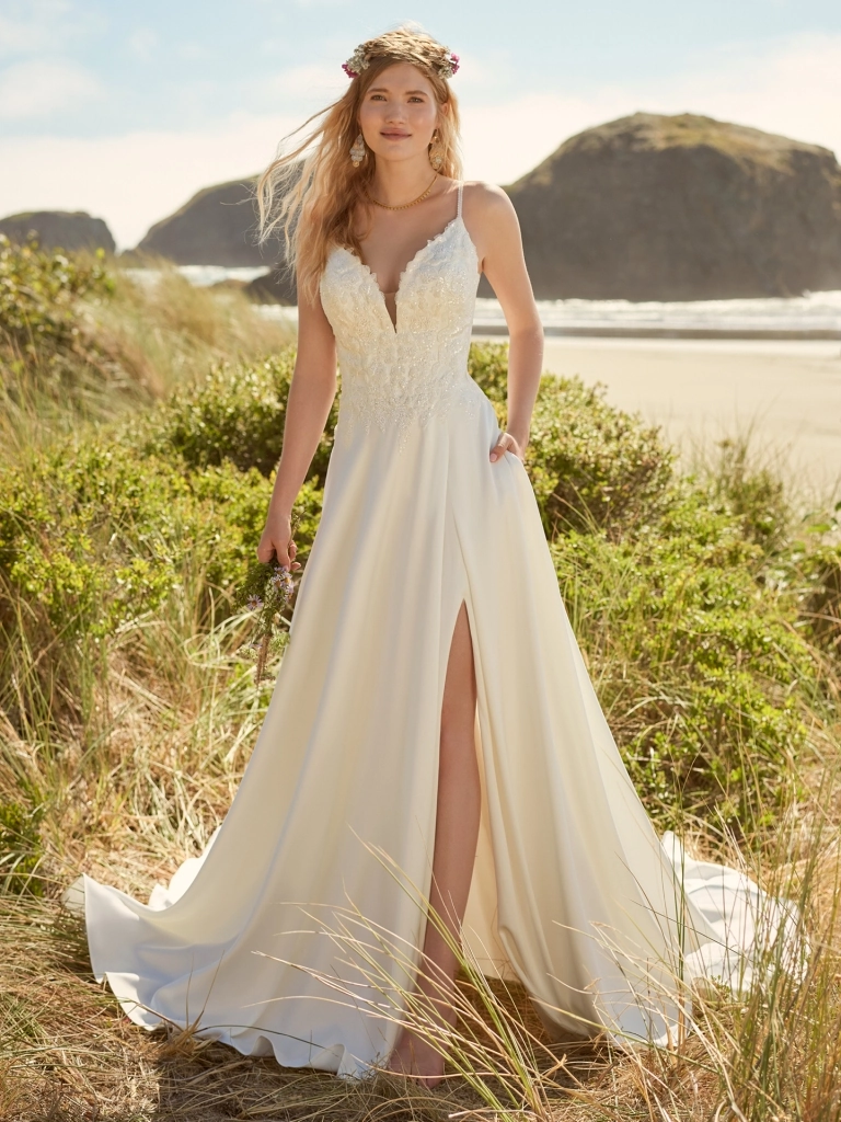 Model wearing white Rebecca Ingram dress