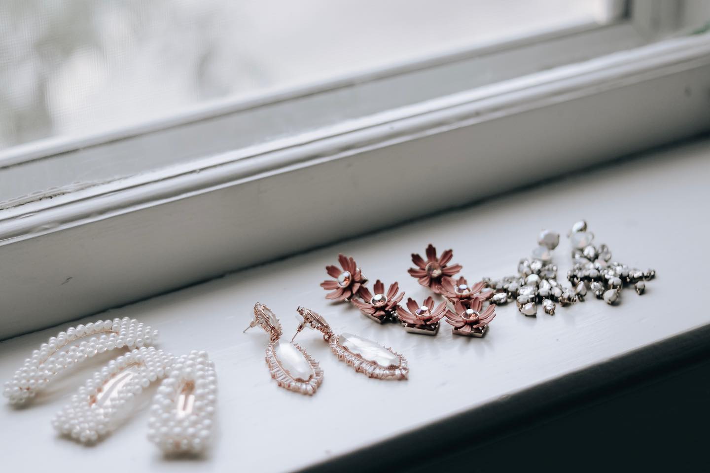 Close-up image of earrings and hair clips